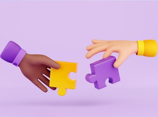 Two hands exchanging puzzle pieces, symbolizing collaboration and school ratings, with a focus on educational assessment and school performance in South Africa.